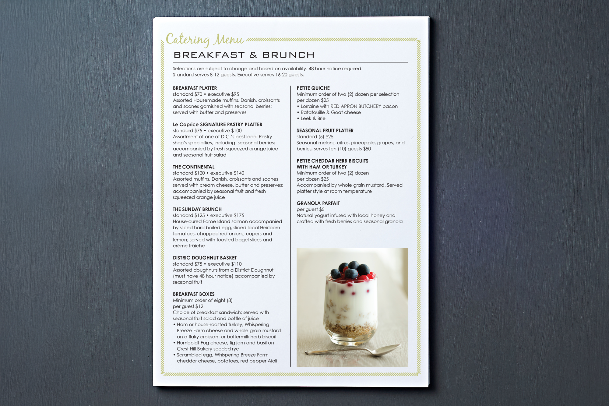 A catering menu featuring a breakfast and brunch selection, detailing various platters, pastries, and breakfast boxes with prices and descriptions.